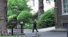 Boris Johnson walks in to press conference to delay lockdown lifting as protests go on outside Downing Street