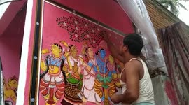 Indian artists decorate houses with stunning mythological murals to attract tourists