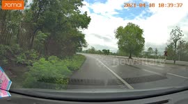 Out-of-control car flips into opposite traffic