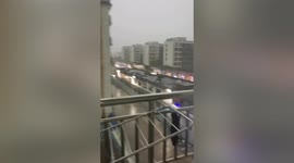 Chinese man nearly struck by lightning when recording rain on balcony