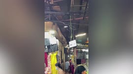 Confusing toilet sign leaves market-goers baffled in Cambodia