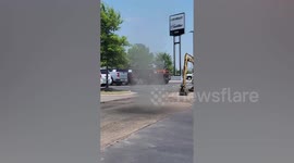 Dust devil forms in parking lot in Arkansas