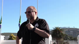 Neil De Beer speaks at gun law protest outside South Africa's parliament
