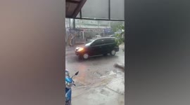 Insanely massive hailstones hit motorists during Indonesian tropical storm