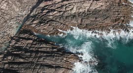 Aerial video of people enjoying the beautiful WA Injidup natural spa down south near Yallingup