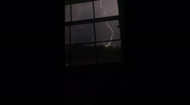 Lightning strikes New York skyline as tornado warning announced