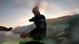 US teen who lost three limbs now surfs and snowboards - 20 YEARS after being told he'd never walk again