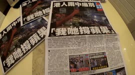 Last-ever copy of pro-democracy Hong Kong tabloid grabbed by lined up customers