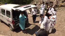 Indian health workers trek deep into Kashmir's forests to jab vaccine-sceptic nomads