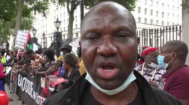 Nigerian protestor Urging the British colonial master Stop to support President Buhari in Nigeria