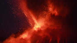 Mount Etna continues to spew lava in spectacular fashion