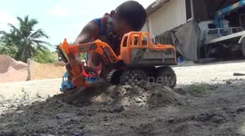 Boy, 7, operates excavator like a pro in Thailand