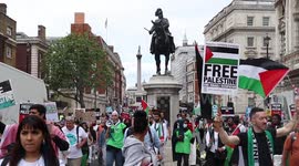 Protesters Climb Bus Stop, Set Off Flares, & Chant. At The National Peoples Assembly/ Unite Against Tory's March. In London