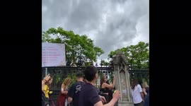 Anti-Lockdown Protesters In London Throw Tennis Balls At Parliament