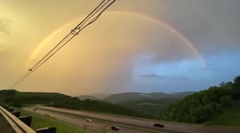 US: Lightning Strikes Through Rainbow In Maryland