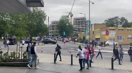 Half-naked England fan waves shirt in middle of roundabout after defeat of Germany