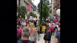 People Walking Through The Streets Of London Protesting Against Lockdown