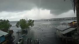 Waterspout tornado rips through coastal homes in the Philippines