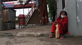 A woman needs help during strict lockdown in Dhaka, Bangladesh