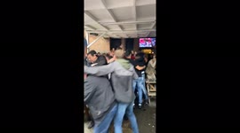 PRECIOUS PINTS: Hilarious moment British man saves his DRINKS from celebrating fans during Euros game