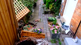 UK neighbours are preparing for a bizarre legal battle over a TRELLIS FENCE