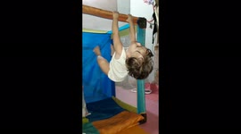 crib work out, little darling has no outdoor toys so he invented one for himself indoor. what a lovely