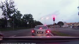 Car almost crashes into truck that lost its brake at junction in Malaysia