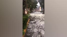 Foam covers streets as heavy hail storm hits Mexico