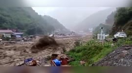 Mudslide hits southern Chinese city, damaging dozens of houses and killing livestock