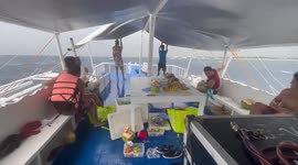 Terrifying moment boat is almost swept away by waves while sailing in the Philippines