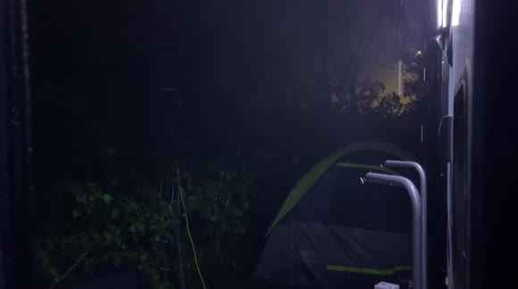 Camping in a severe thunderstorm pouring rain, hail, lightning and wind