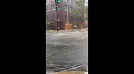 Water pours up from drains in New Haven as Storm Elsa moves up NE coast of US