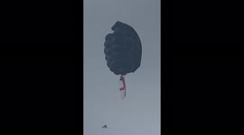 Weird moment huge grenade hot air balloon flies England flag over Manchester