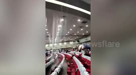 Rain check on meeting? Conference hall in China inundated by leaky roof