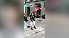 UK soap legend John Altman burst into an impromptu musical performance to entertain passers-by in London