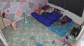 Adorable toddler wakes up in night and covers shivering father in blanket