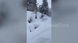 Hilarious moment skier flies HEAD FIRST into a wall of snow in Switzerland