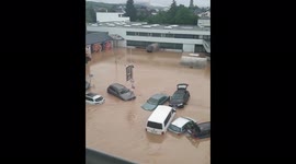 Flood washes away cars in western Germany after torrential rains