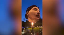 Bizarre giant head hot air balloon lifts off from park in Tokyo, Japan