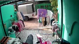 Woman slips over while rushing to take laundry in garage