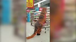Wacky grandson wears DINOSAUR costume to take grandma shopping while keeping her safe