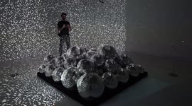 People visit immersive art experience by artists Kyle McDonald and Jonas Jongejan