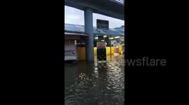 The flood outside of Matunga railway station in Mumbai, India