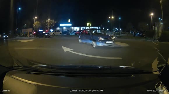 Caught On Dashcam   A older male driver cuts a roundabout narrowly missing my Vehicle and bounces off the kerbs
