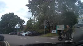 British OAP recklessly drives the wrong way on mobility scooter on one-way road