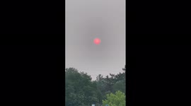 Smoke from West Coast wildfires turns moon into red with hazy skies