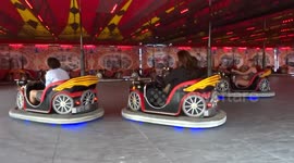 Fun for all ages - visitors enjoy vintage fairground rides at the London Wonderground in Earls Court