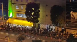 Thousands gathered outside the stadium in Tokyo, Japan