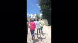 Tourists run for their lives as deadly landslide tears down hill towards village