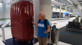 Unreasonable traveler with huge carry on baggage.